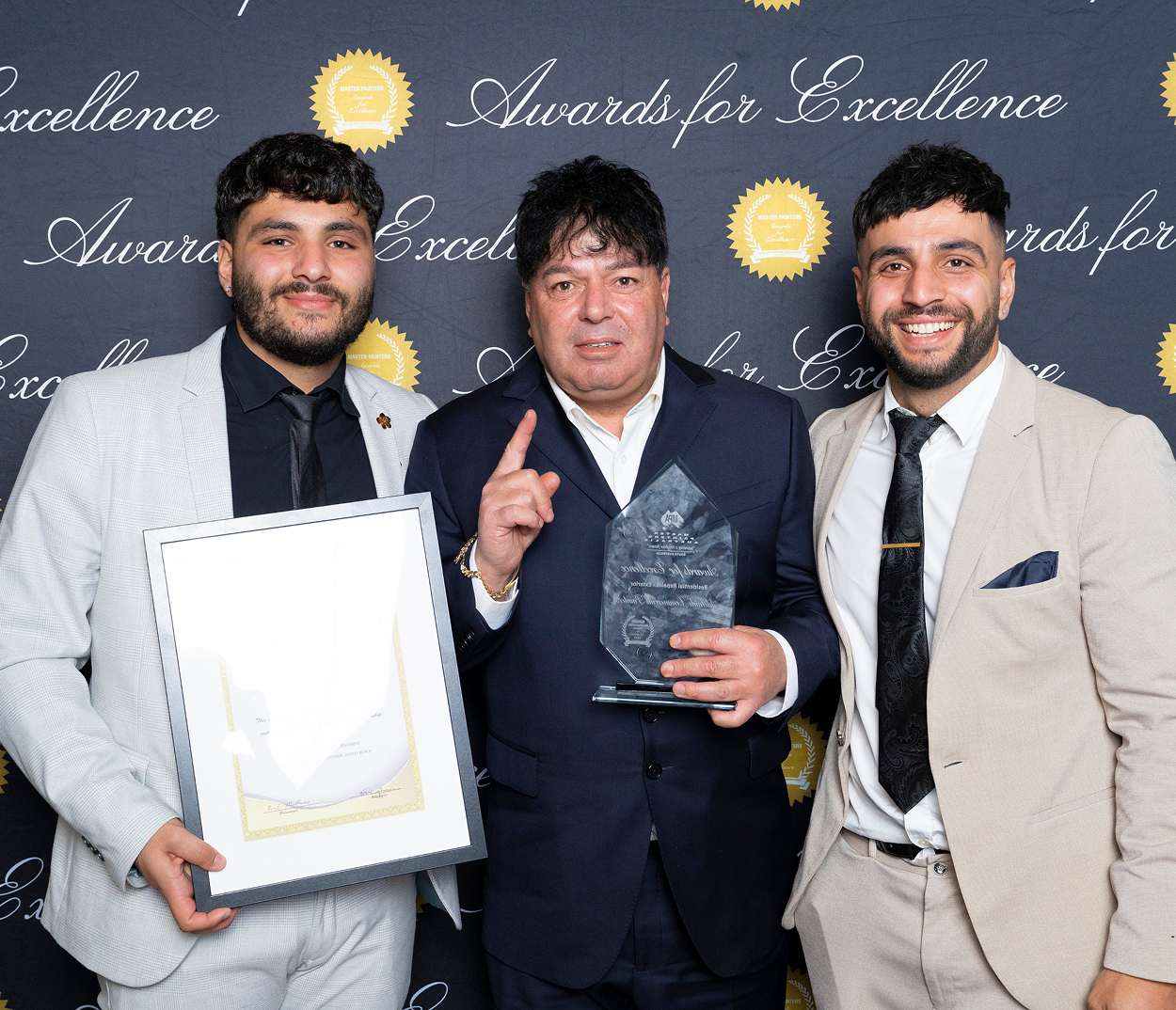 ACP team accepting a Master Painters award