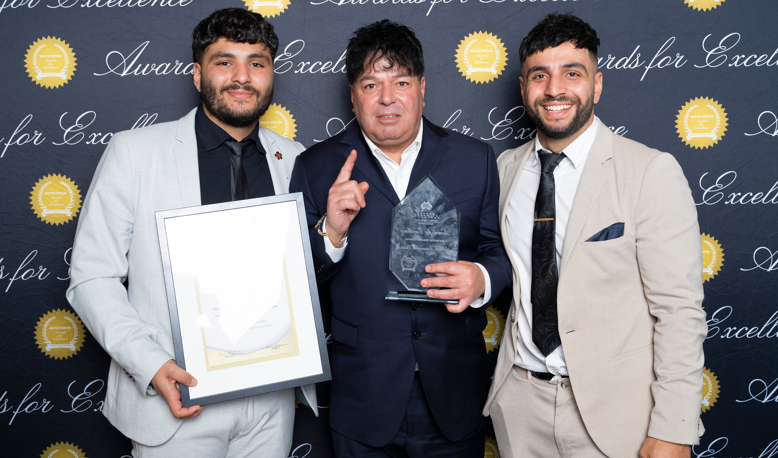 ACP team accepting a Master Painters award