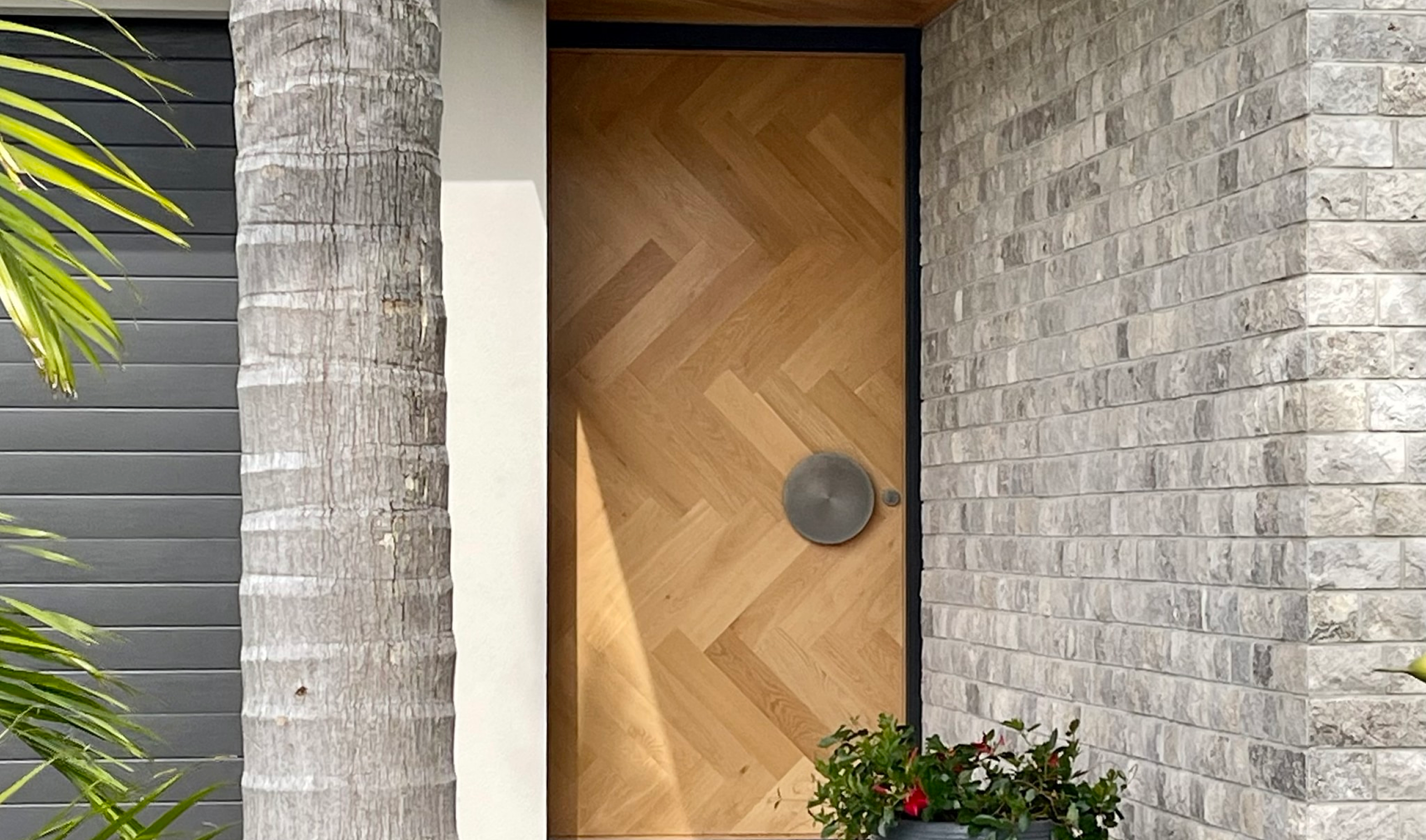 A decorative timber entrance finished by ACP