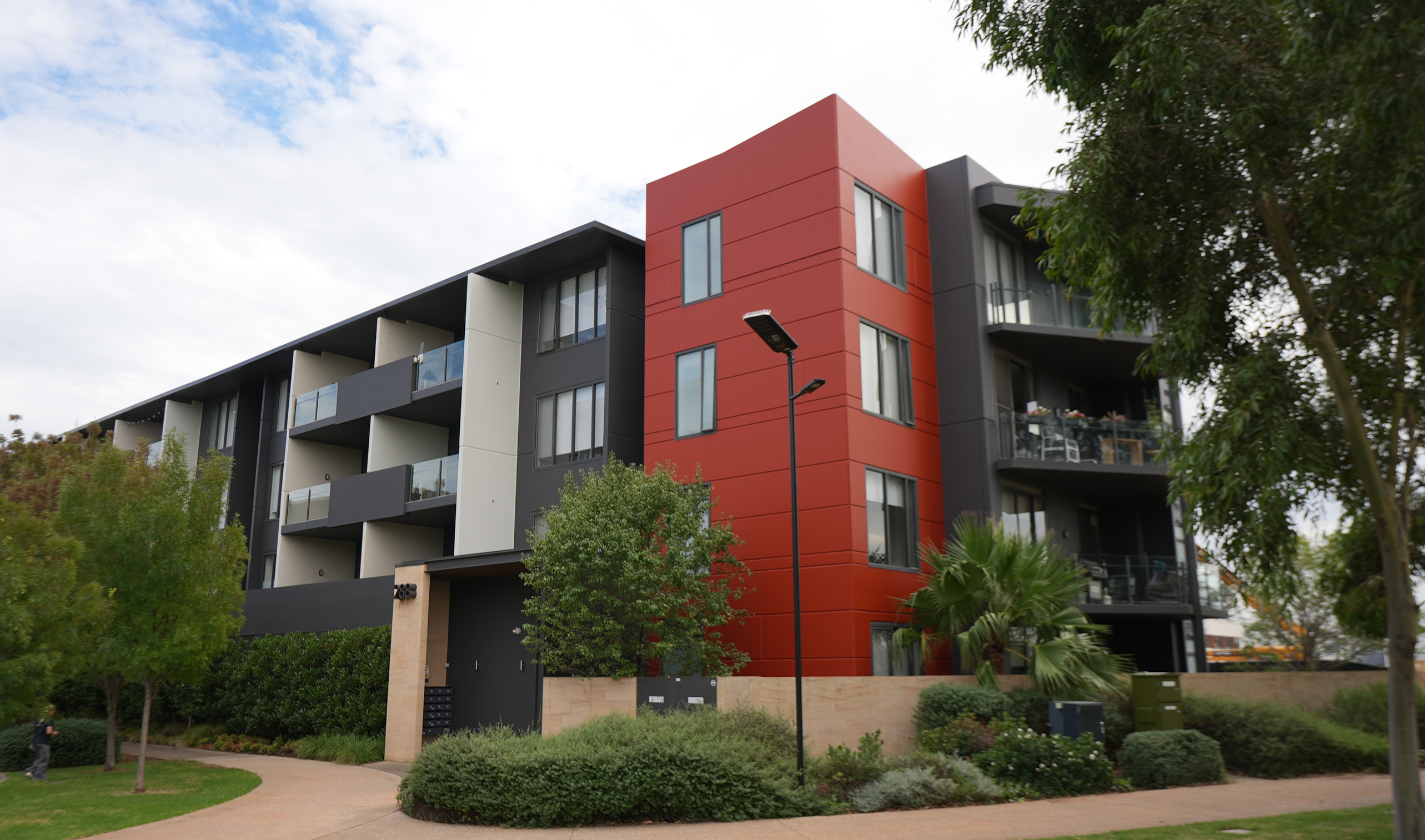 A strata apartment complex painted by ACP